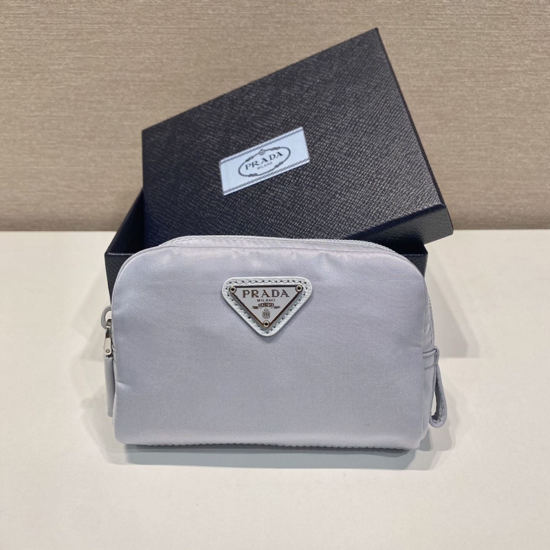 Pra*a clutch bags